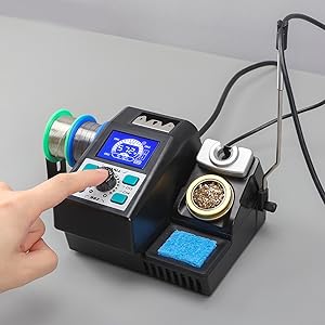 A man is pressing the menu button of the YIHUA 982 precision soldering station 