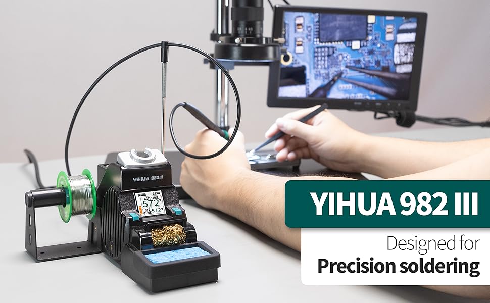 A man is using the YIHUA 982-III soldering station for precision soldering